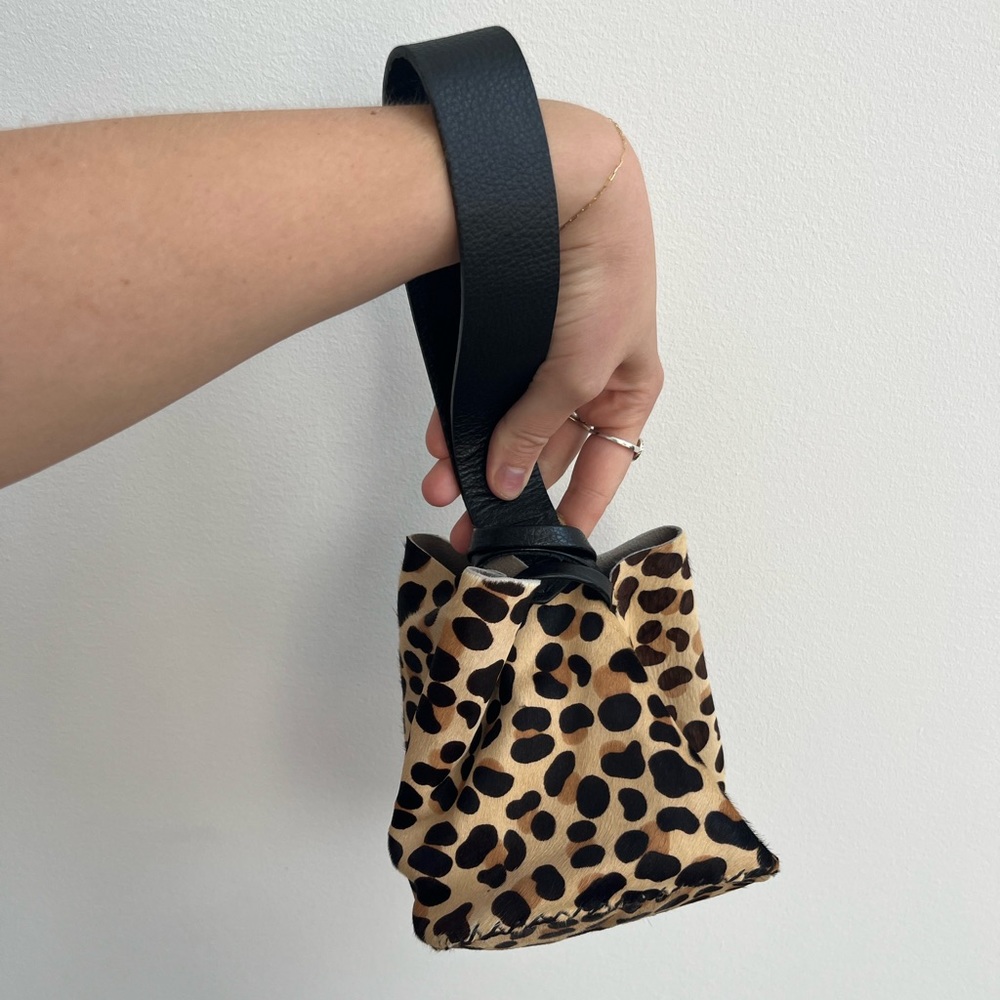 Genuine leather cheetah wrist bag
